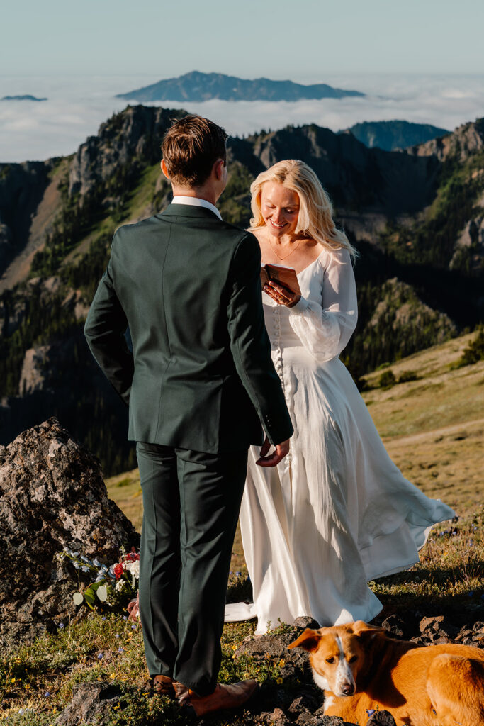 a bride reads her vows to her groom during their Olympic Peninsula elopement. 