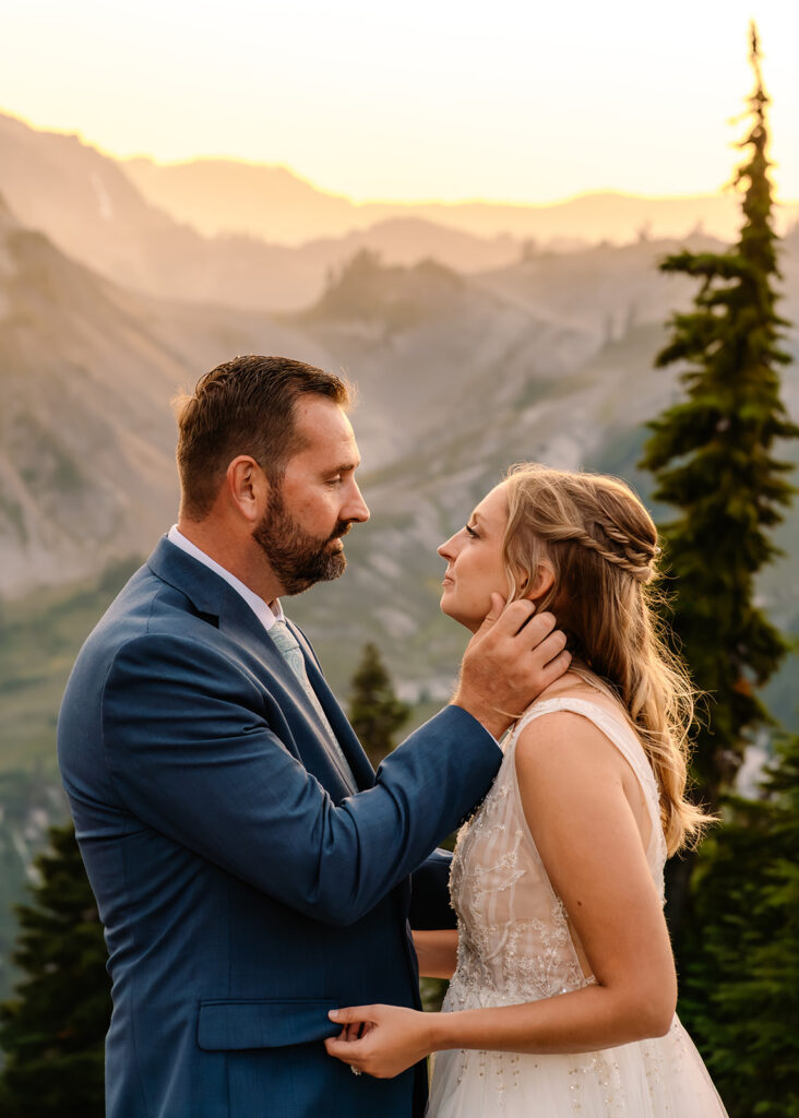 a groom stroked the cheek of his bride in a quiet moment during their mt baker micro wedding 