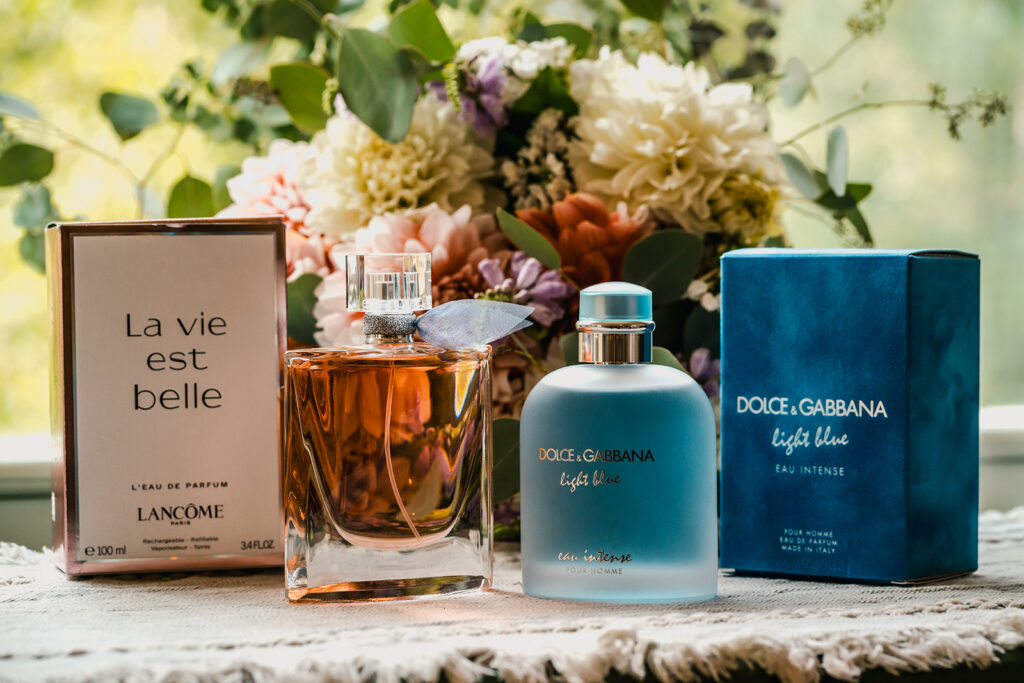 a detail shot of the perfume and cologne the couple chose to wear