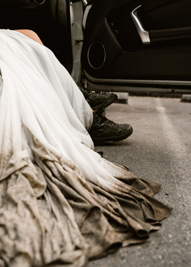 Shots of brides shoes and dirty dress during her waterfall elopement